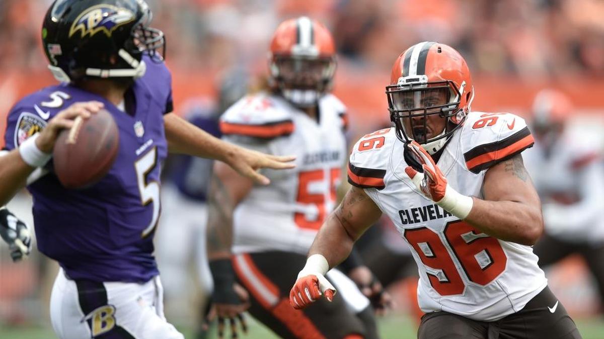 Cleveland Browns defensive lineman Xavier Cooper (96) pressures Baltimore Ravens quarterback Joe Flacco on Sept. 18, 2016, in Cleveland. Cooper was signed by the 49ers after being waived by the Browns.