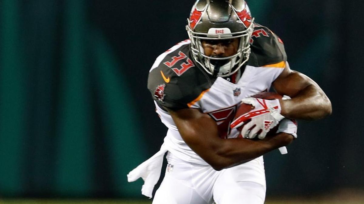 Tampa Bay Buccaneers running back Jeremy McNichols (33) runs against the Tampa Bay Buccaneers during the second half of an NFL preseason football game, Thursday, Aug. 17, 2017, in Jacksonville, Fla.