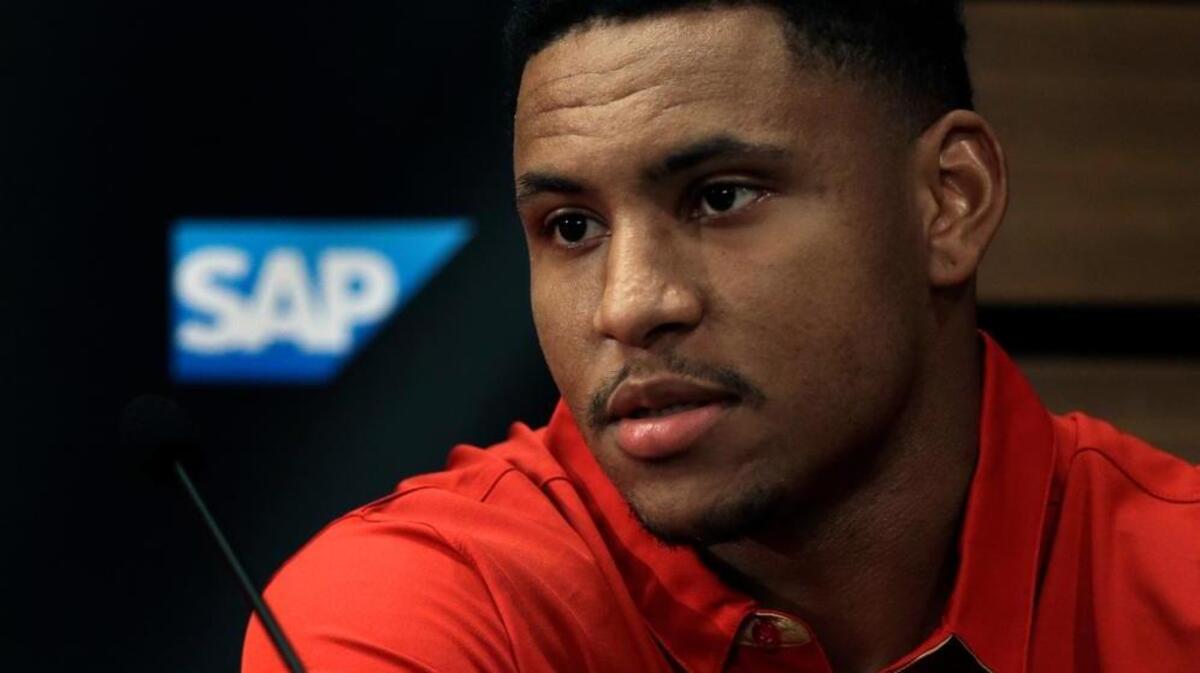 San Francisco 49ers linebacker Malcolm Smith answers questions from reporters during a media conference Friday, March 10, 2017, in Santa Clara, Calif.