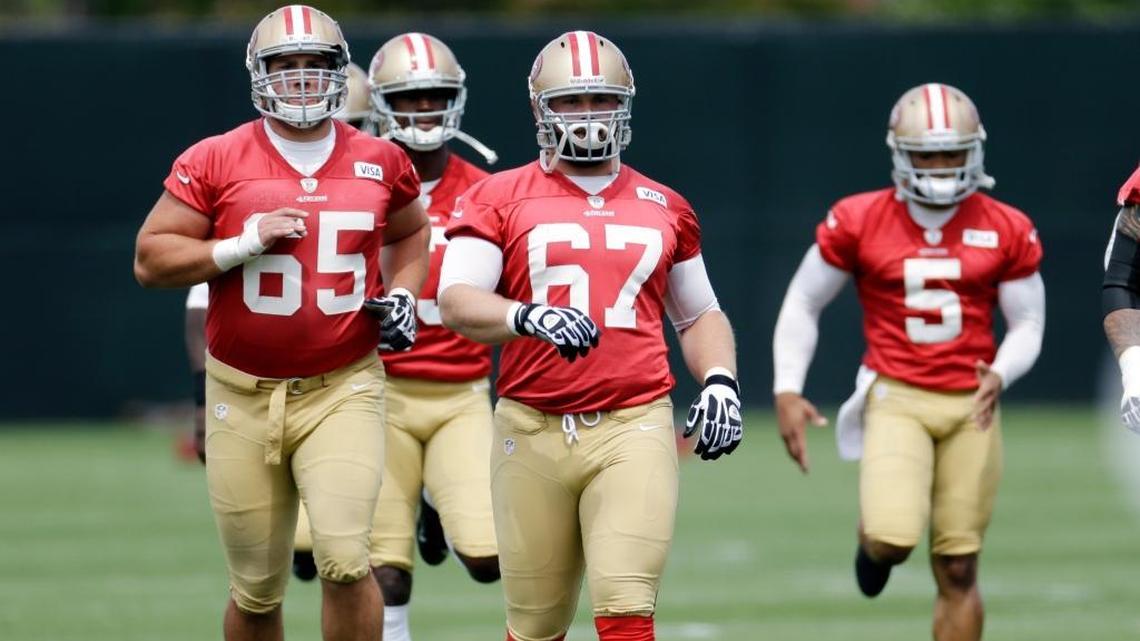San Francisco 49ers' Al Netter (65), Daniel Kilgore (67) and B.J. Daniels (5) during practice at the team's NFL football training facility in Santa Clara, Calif., Tuesday, June 11, 2013.