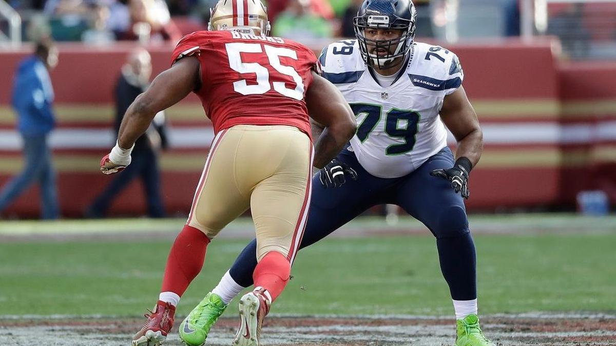 Seattle Seahawks tackle Garry Gilliam (79) blocks San Francisco 49ers linebacker Ahmad Brooks (55) during an NFL football game in Santa Clara, Calif., Sunday, Jan. 1, 2017.