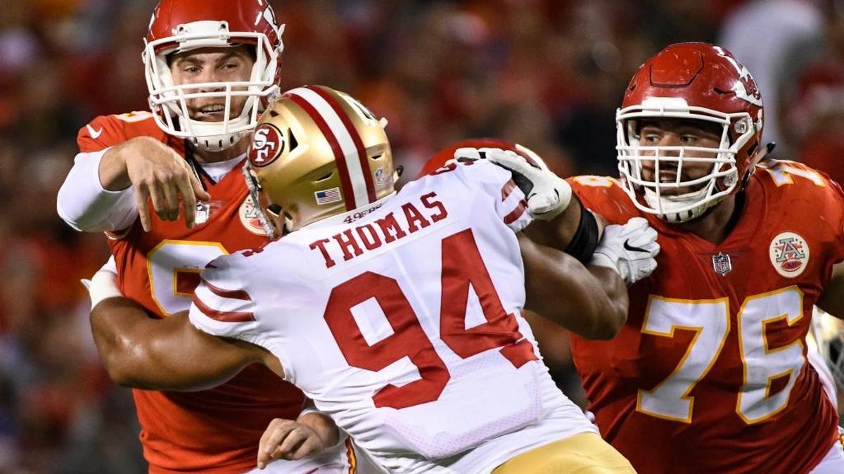 Kansas City Chiefs quarterback Tyler Bray (9) is pressured by San Francisco 49ers defensive lineman Solomon Thomas (94) during the first half of an NFL preseason football game in Kansas City, Mo., Friday, August 11, 2017.