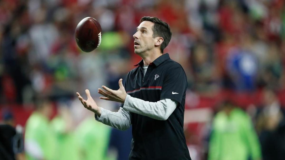 The 49ers hired Atlanta Falcons offensive coordinator Kyle Shanahan as their new coach, Monday, Feb. 6, 2017. ... Shanahan passes time before an NFL football NFC divisional playoff game between the Falcons and the Seattle Seahawks, Saturday, Jan. 14, 2017, in Atlanta.