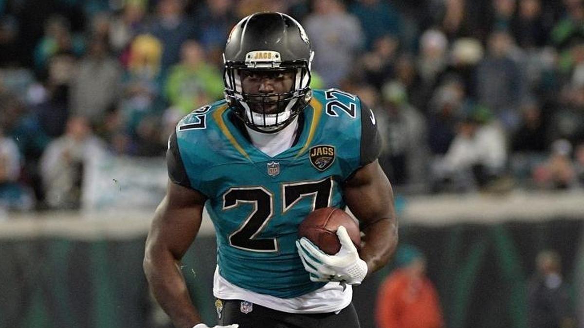 Jacksonville Jaguars running back Leonard Fournette (27) runs past Seattle Seahawks defensive tackle Jarran Reed (90) for a gain during the second half of an NFL football game, Sunday, Dec. 10, 2017, in Jacksonville, Fla.