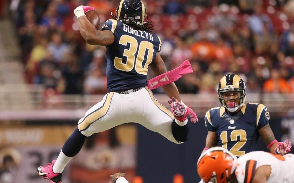 Rookie St. Louis Rams running back Todd Gurley leaps over Cleveland Browns defensive back K’Waun Williams on a 14-yard run in second quarter of an NFL football game on Sunday, Oct. 25, 2015, in St. Louis. Gurley has rushed for 442 yards in four games this season, and has not rushed for fewer than 128 since Week 1. He’ll be on the 49ers’ radar Sunday in St. Louis.