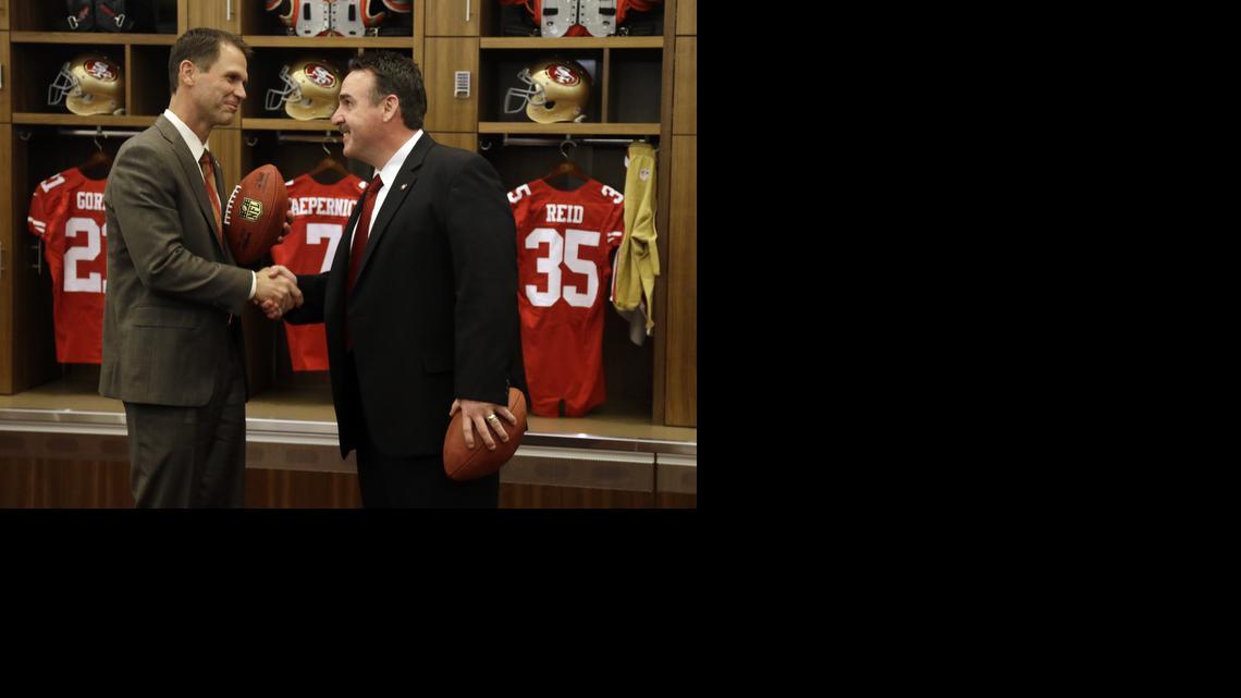 
San Francisco general manager Trent Baalke, left, and new 49ers coach Jim Tomsula made it clear that a physical ground game  will be the focus in 2015.
