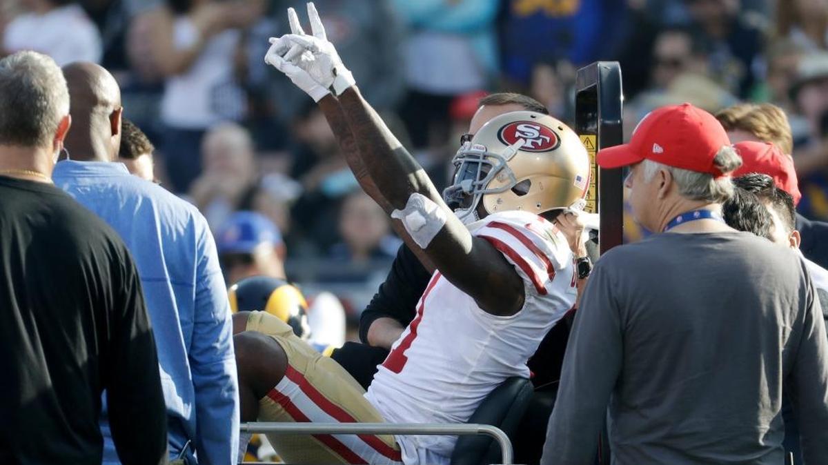 San Francisco 49ers wide receiver Marquise Goodwin is taken off the field after being injured during the first half of an NFL football game against the Los Angeles Rams Sunday, Dec. 31, 2017, in Los Angeles.