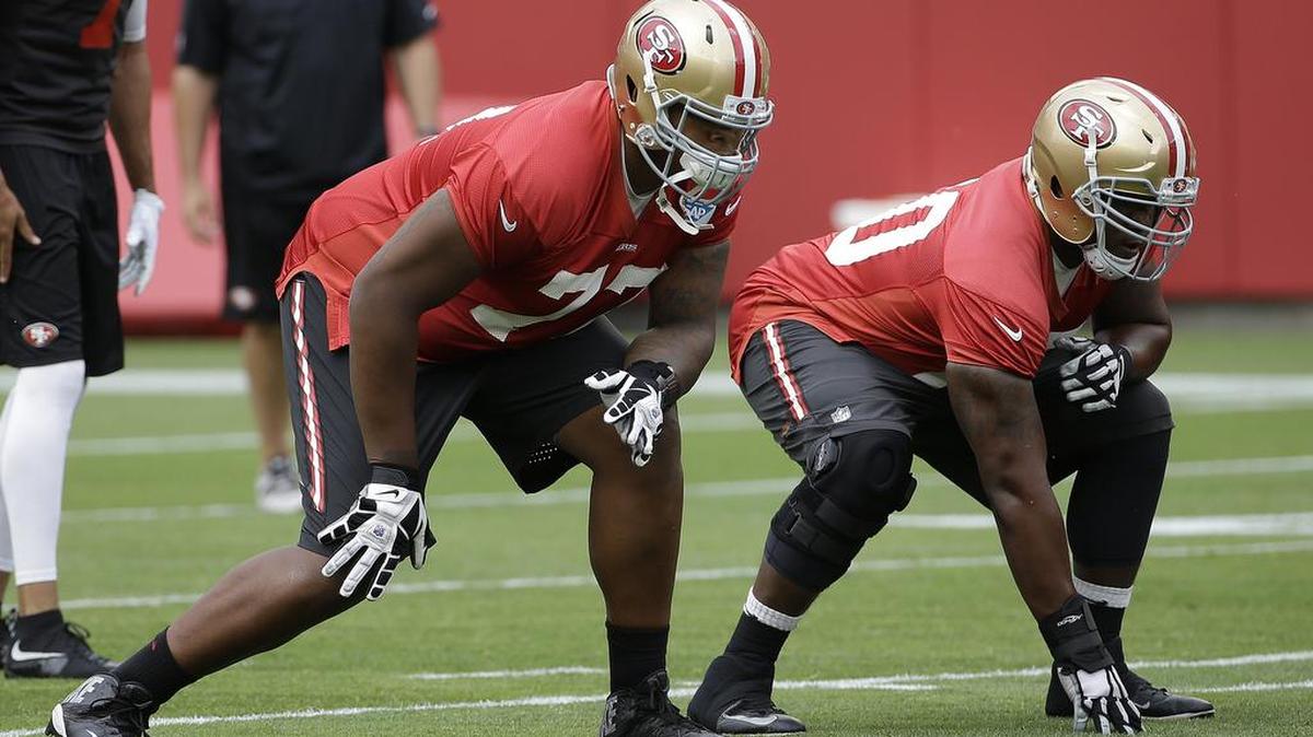 FILE - In this June 9, 2015, file photo, San Francisco 49ers offensive linemen Trent Brown, left, and Brandon Thomas line up during an NFL football mini-camp in Santa Clara.