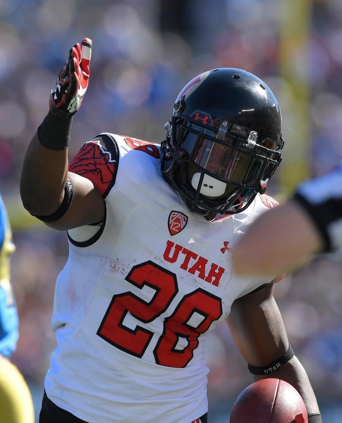 Utah running back Joe Williams celebrates after making a first down during the first half of an NCAA college football game against UCLA, Saturday, Oct. 22, 2016, in Pasadena, Calif.
