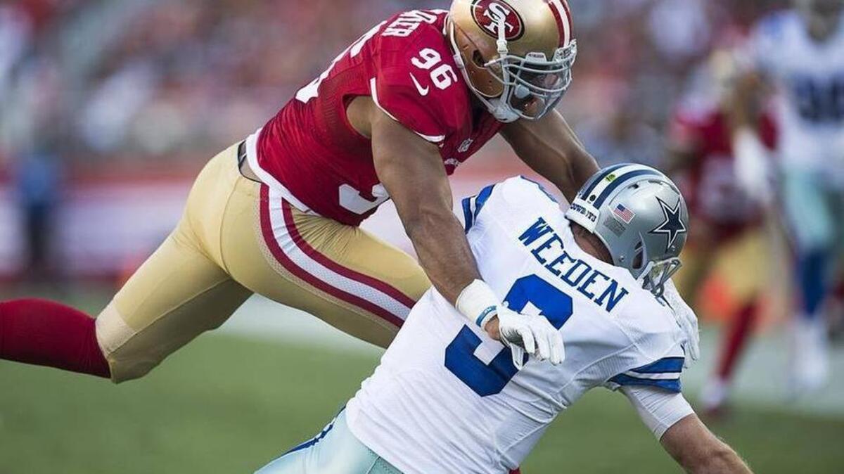 
49ers outside linebacker Corey Lemonier runs down Cowboys quarterback Brandon Weeden in the second game of the 2015 preseason.
