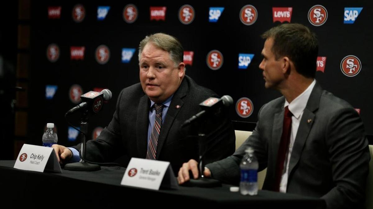 San Francisco 49ers head coach Chip Kelly, left, speaks beside General Manager Trent Baalke during a media conference Wednesday, Jan. 20, 2016, in Santa Clara, Calif.