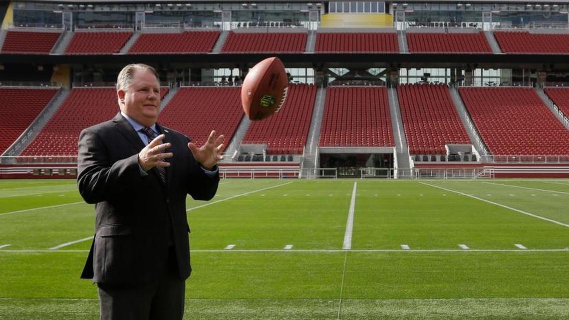 New San Francisco 49ers head coach Chip Kelly catches a football on the field at Levi Stadium Wednesday, Jan. 20, 2016, in Santa Clara, Calif.