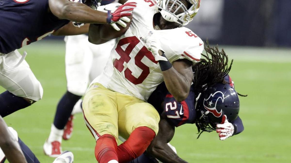 
San Francisco 49ers' Asante Cleveland (45) is hit by Houston Texans' Terrance Parks (27) during the second half of an NFL preseason football game, Saturday, Aug. 15, 2015, in Houston.
