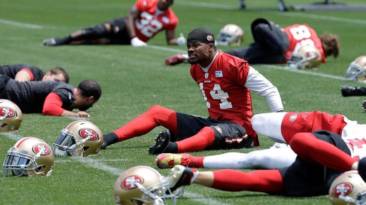 
San Francisco 49ers wide receiver Jerome Simpson stretches during practice at an NFL football facility in Santa Clara, Calif., Friday, May 29, 2015. 
