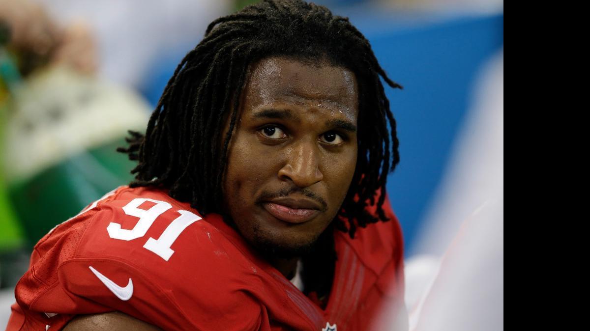
In this Sept. 7, 2014, file photo, former Ray McDonald, then playing for the 49ers, sits on the bench against the Dallas Cowboys in Arlington, Texas. 
