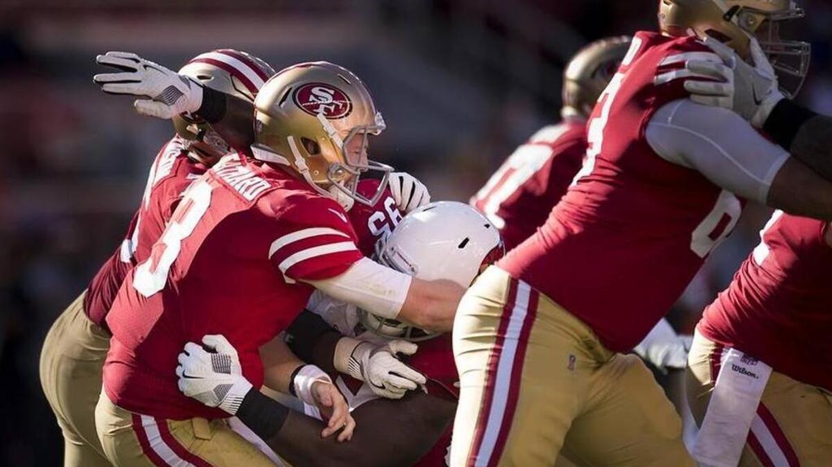 Rookie quarterback C.J. Beathard (3) attempted 51 passes and was hit 16 times in the 49ers’ home loss to the Arizona Cardinals on Sunday.