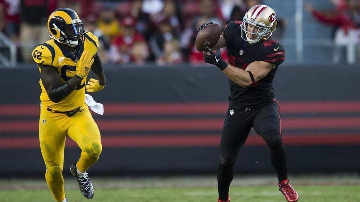 San Francisco 49ers fullback Kyle Juszczyk (44) catches a pass in front of Los Angeles Rams inside linebacker Alec Ogletree (52) in the second quarter.