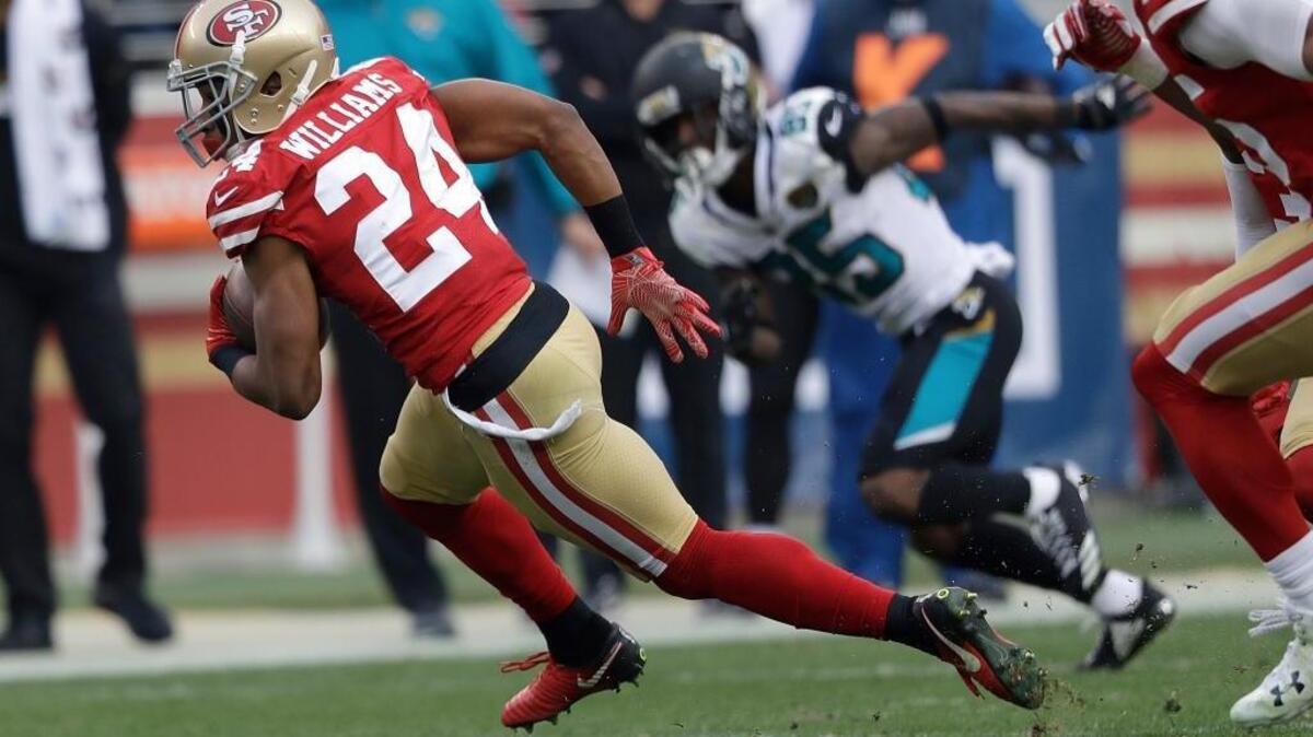 Cornerback K’Waun Williams (24) returns an interception against the Jacksonville Jaguars in the third quarter of the 49ers’ 44-33 victory Sunday at Levi’s Stadium.