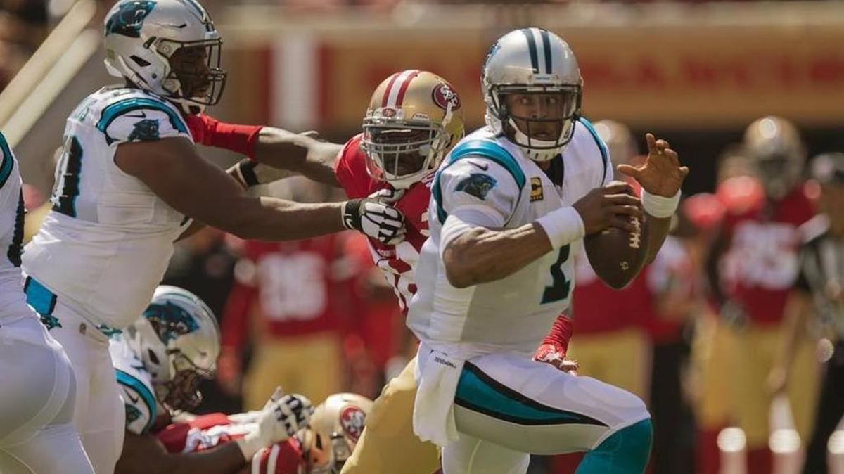 Carolina Panthers quarterback Cam Newton, seen in a 2017 game against San Francisco, is sidelined by a foot injury, but NFL Network David Carr says Kyle Allen is a better fit for an offense coordinated by Norv Turner than the former league MVP.
