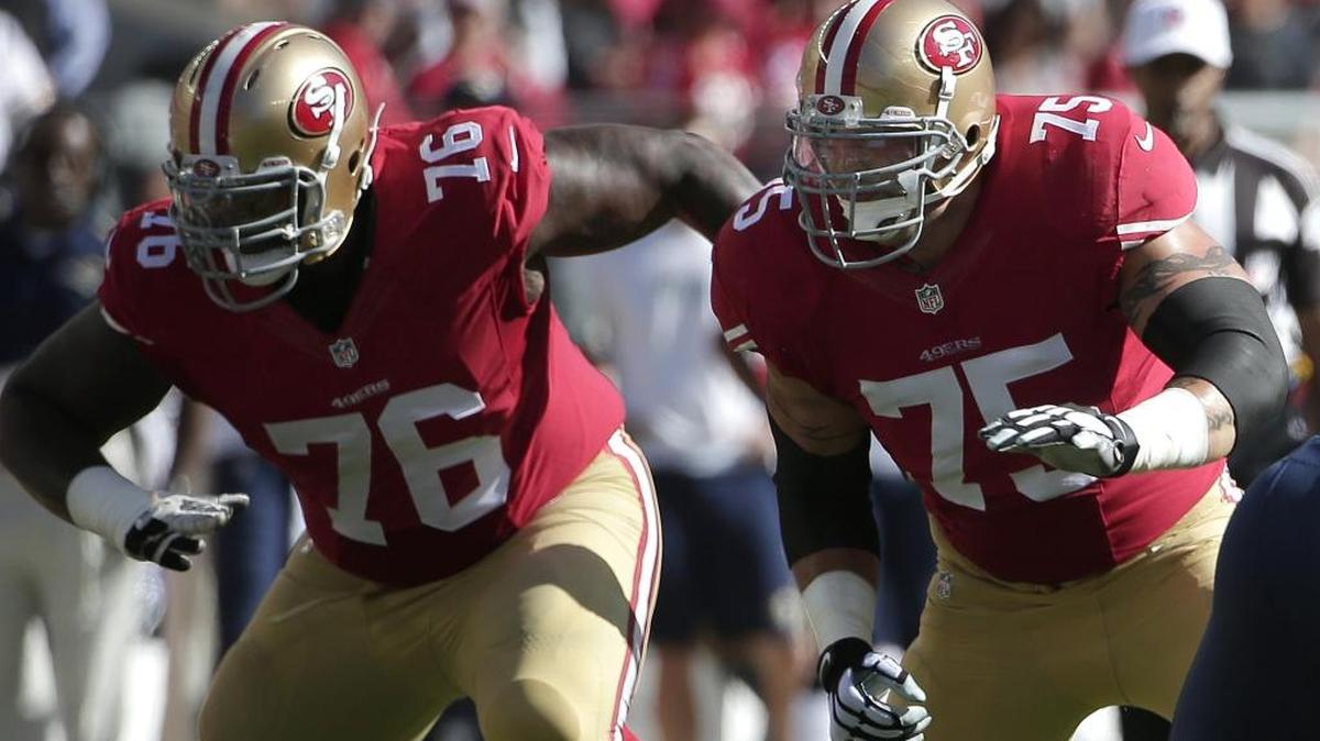 San Francisco 49ers offensive tackle Anthony Davis (76) and offensive tackle Alex Boone (75) block against the St. Louis Rams during the first quarter of an NFL football game in Santa Clara, Calif., Sunday, Nov. 2, 2014.