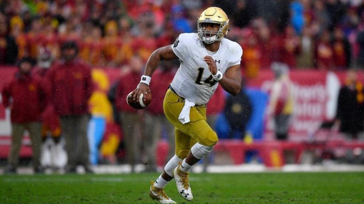 Notre Dame quarterback DeShone Kizer runs the ball during the first half of an NCAA college football game against Southern California, Saturday, Nov. 26, 2016, in Los Angeles.