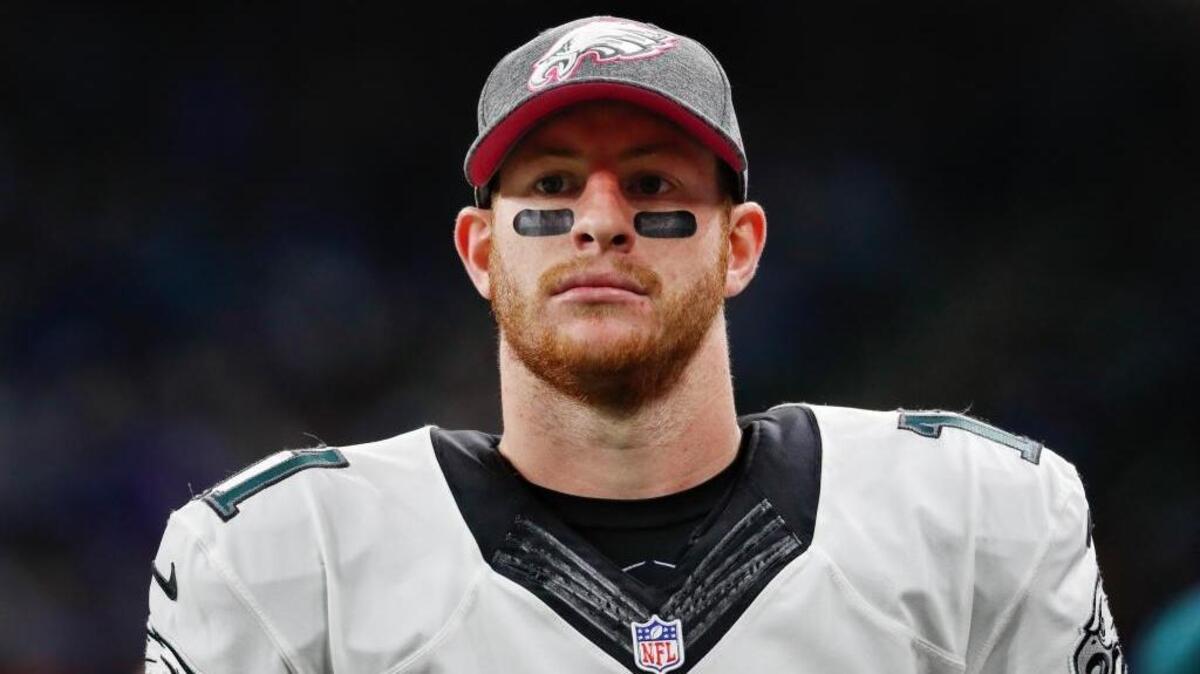 Philadelphia Eagles quarterback Carson Wentz watches from the sidelines against the Detroit Lions during an NFL football game in Detroit, Sunday, Oct. 9, 2016. Detroit beat Philadelphia 24-23.