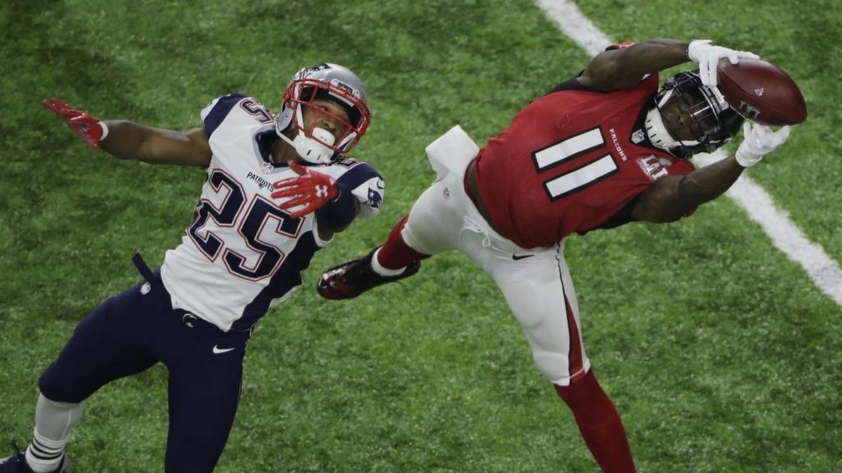 Atlanta Falcons wide receiver Julio Jones (11) makes a catch against the New England Patriots’ Eric Rowe during the second half of Super Bowl 51 on Sunday, Feb. 5, 2017, in Houston.