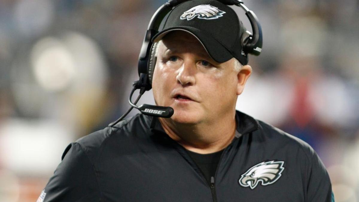 In this Oct. 25, 2015, file photo, Philadelphia Eagles head coach Chip Kelly watches the action from the sidelines in the first half of an NFL football game against the Carolina Panthers in Charlotte, N.C. The San Francisco 49ers have hired Chip Kelly as their new head coach. CEO Jed York announced the move on Twitter and so did the team.