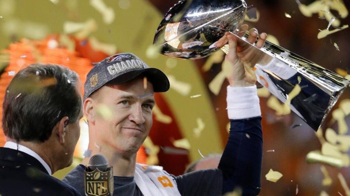 Denver Broncos quarterback Peyton Manning holds the Lombardi Trophy after the team’s Super Bowl 50 victory over the Carolina Panthers on Sunday, Feb. 7, 2016, in Santa Clara, Calif. Manning became the first quarterback to lead two different teams to a Super Bowl win.