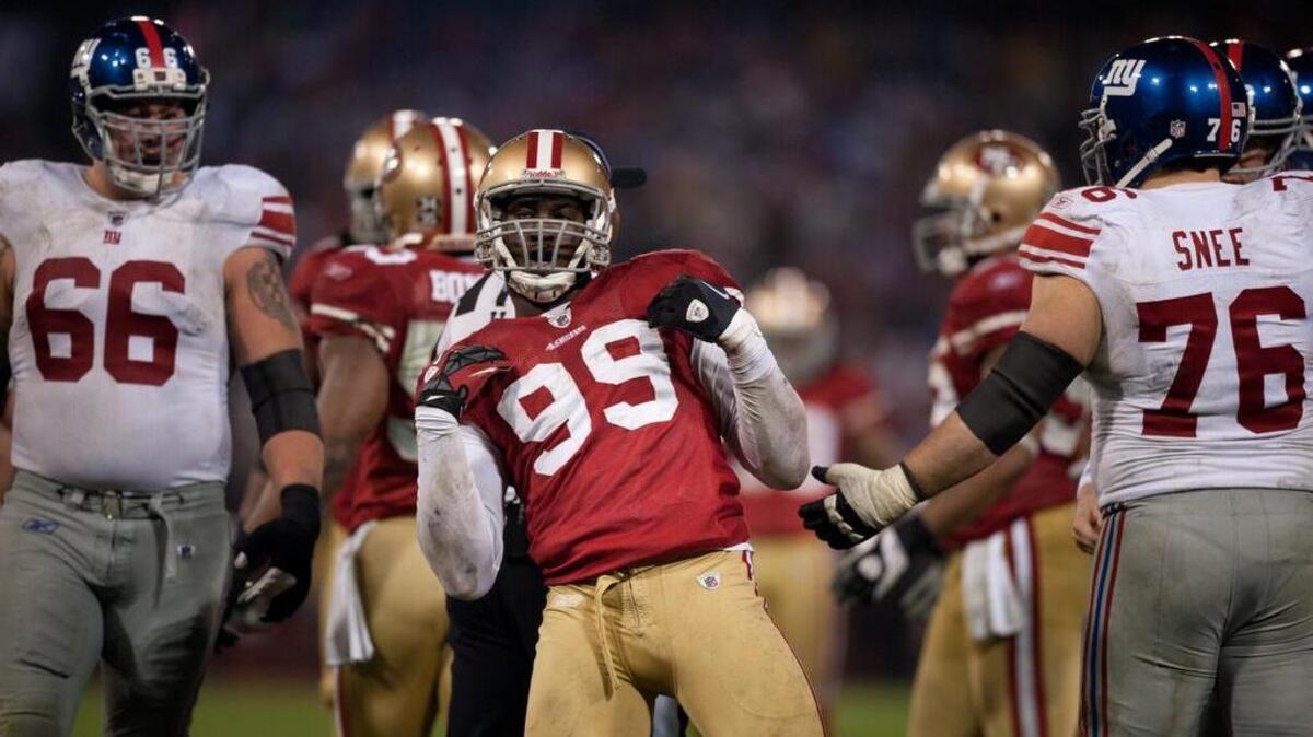 49ers outside linebacker Aldon Smith celebrates a sack of New York Giants quarterback Eli Manning during the NFC championship game at Candlestick Park on Jan. 22, 2012.