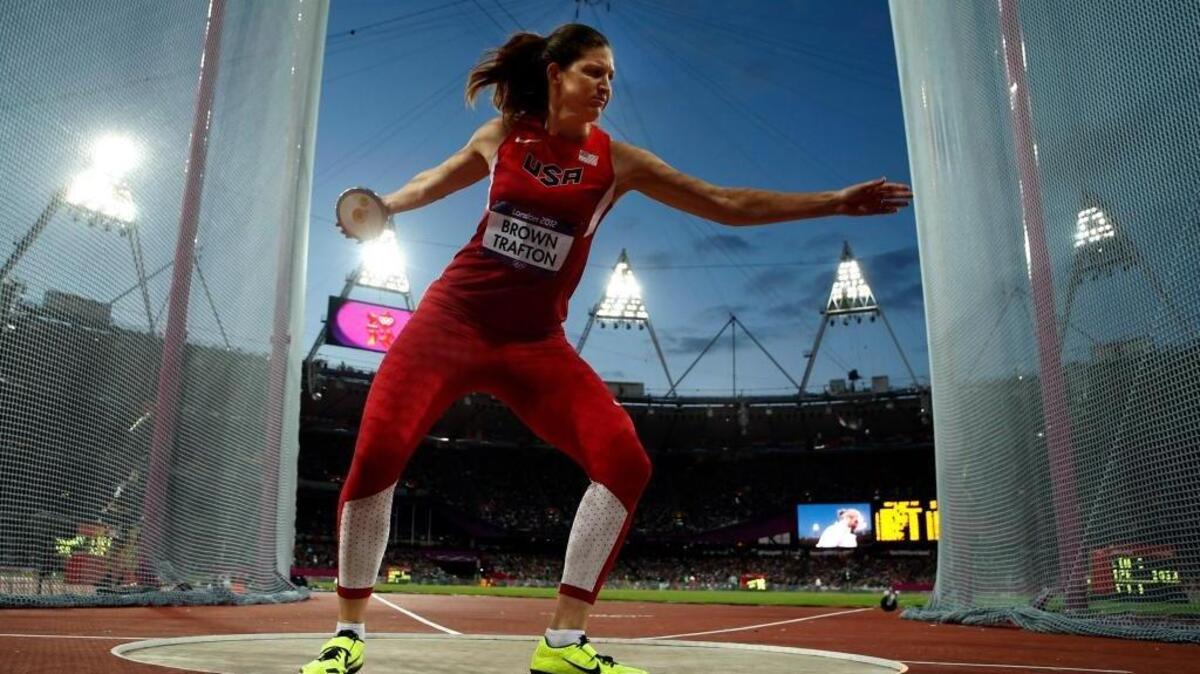 Stephanie Brown Trafton makes an attempt during the women’s discus qualification at the Olympic Stadium at the 2012 Summer Olympics, Friday, Aug. 3, 2012, in London.