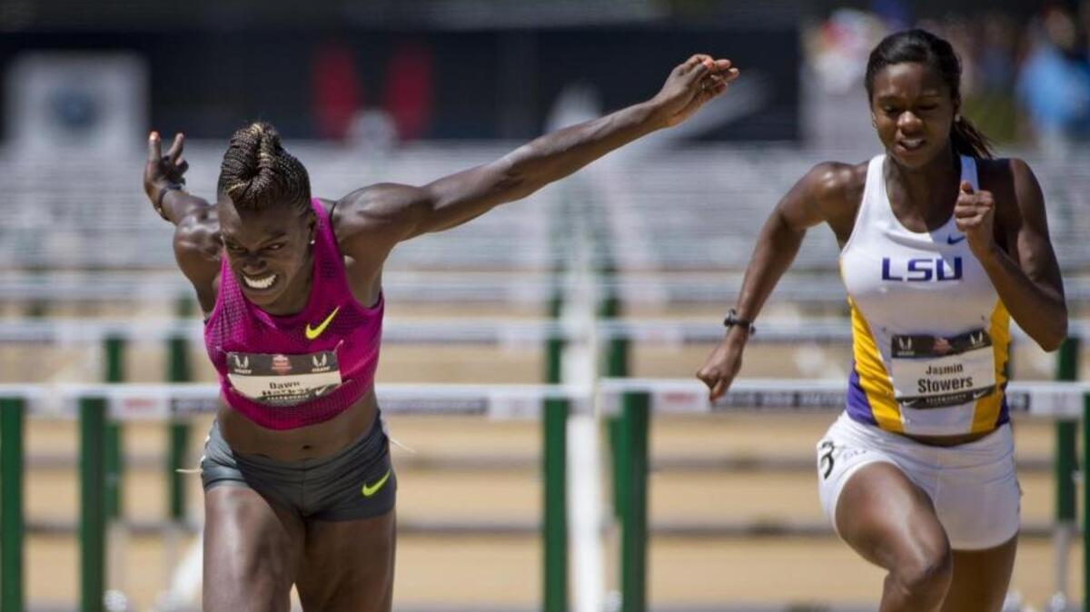 Dawn Harper-Nelson wins the women’s 100-meter hurdles final with a time of 12.55 seconds during the USATF Championships at Sacramento State on Saturday June 28, 2014 in Sacramento, Calif. Jasmin Stowers, right, finished fourth in 12.78.