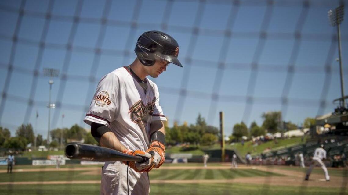 Kelby Tomlinson’s heart is in San Francisco, but his glove is in Sacramento