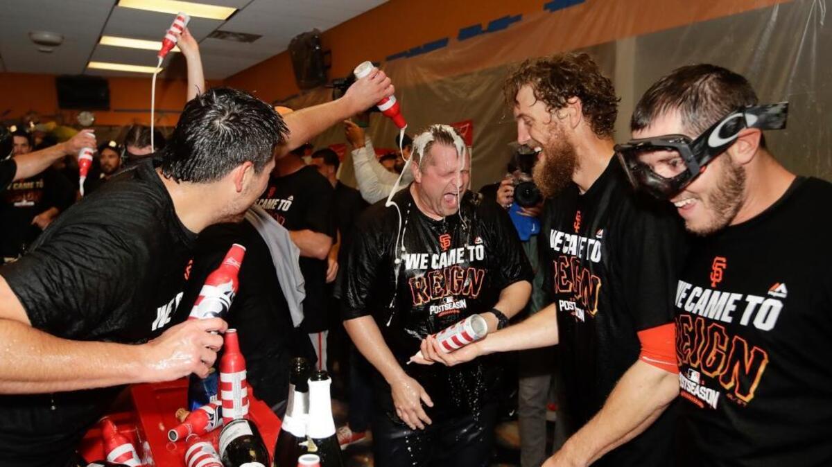 The San Francisco Giants celebrate after beating the New York Mets 3-0 in the National League Wild-Card Game on Wednesday, Oct. 5, 2016, in New York. The Giants travel to face the Chicago Cubs on Friday in baseball’s National League Division Series.
