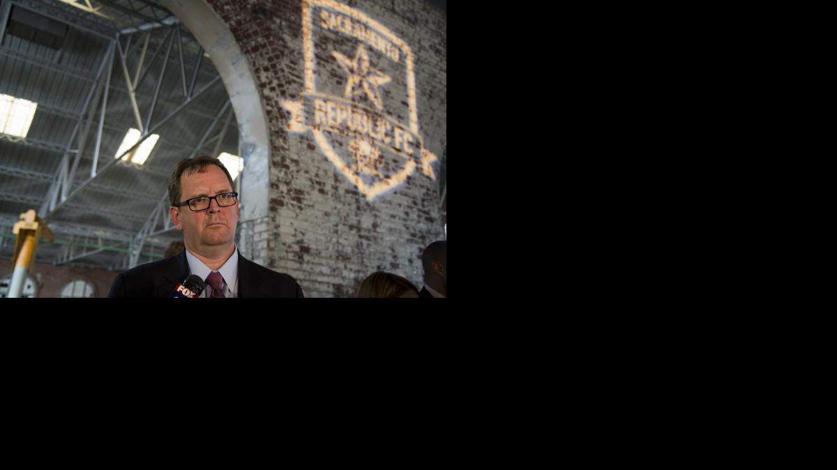 
Major League Soccer Deputy Commissioner Mark Abbott answers questions during a September news conference in Sacramento with representatives from the city, Downtown Railyard Venture LLC, Think Big and Sacramento Republic FC.
