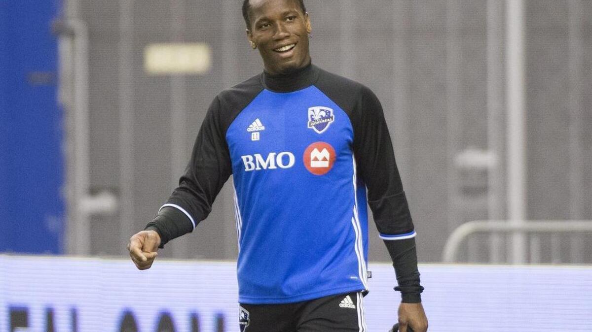 Didier Drogba, shown at a training session in Montreal this month, is working out in Sacramento, where he can practice on grass instead of an artificial surface to protect his balky left knee.