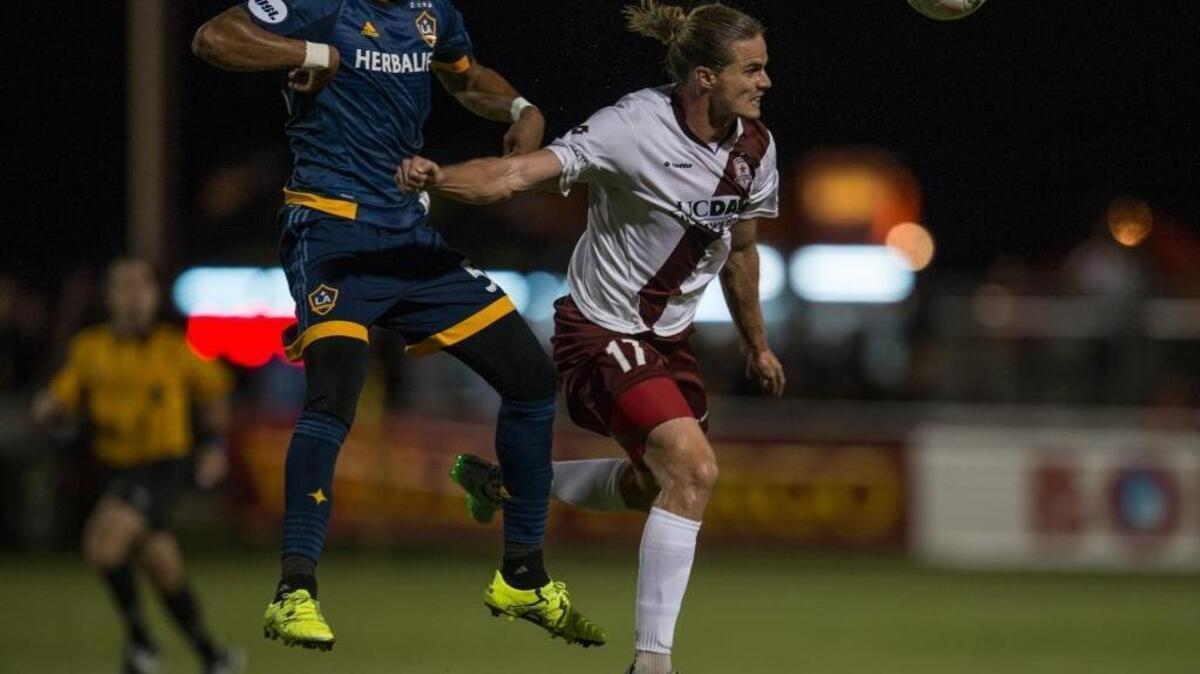 
Republic FC forward Justin Braun (17) heads the ball during the second half of a playoff game between against LA Galaxy II on Saturday in Sacramento.
