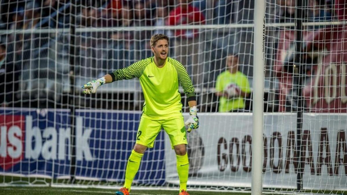 Sacramento Republic FC goalkeeper Evan Newton (12) gestures to a teammate during the first half against Major League Soccer team the Colorado Rapids on Feb. 13, 2016, at at Bonney Field in Sacramento.