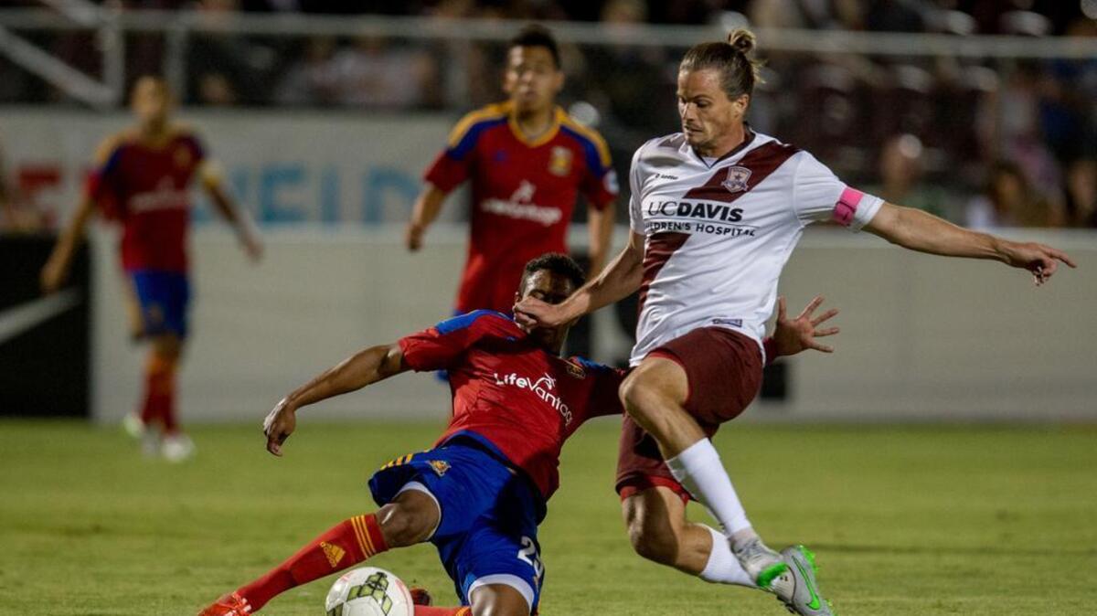 
Republic FC forward Justin Braun (17) fights for the ball against a Monarchs defender during the first half at a game between the Sacramento Republic FC and the Salt Lake City Real Monarchs SLC Saturday.
