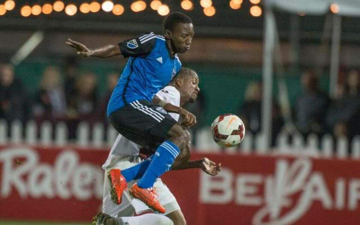 
Earthquakes midfielder Cordell Cato, front, and Republic FC defender Bilal Duckett battle for the ball on Saturday night at Bonney Field.
