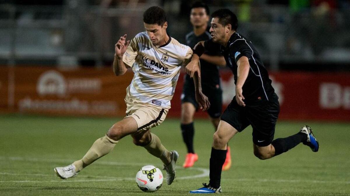 Sacramento Republic FC forward Adnan Gabeljic (13) fights for the ball during the second half at a game between Sacramento Republic FC and Chula Vista FC on Wednesday, May 27, 2015, in Sacramento.
