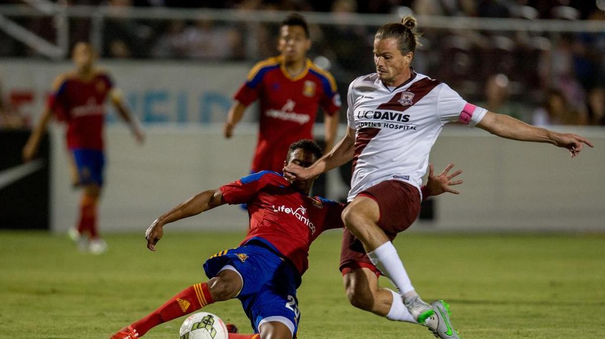 
Republic FC forward Justin Braun (17) fights for the ball against a Salt Lake City defender during the first half in a match between the Sacramento Republic FC and the Salt Lake City Real Monarchs SLC on Saturday, Aug. 22, 2015, in Sacramento, Calif.
