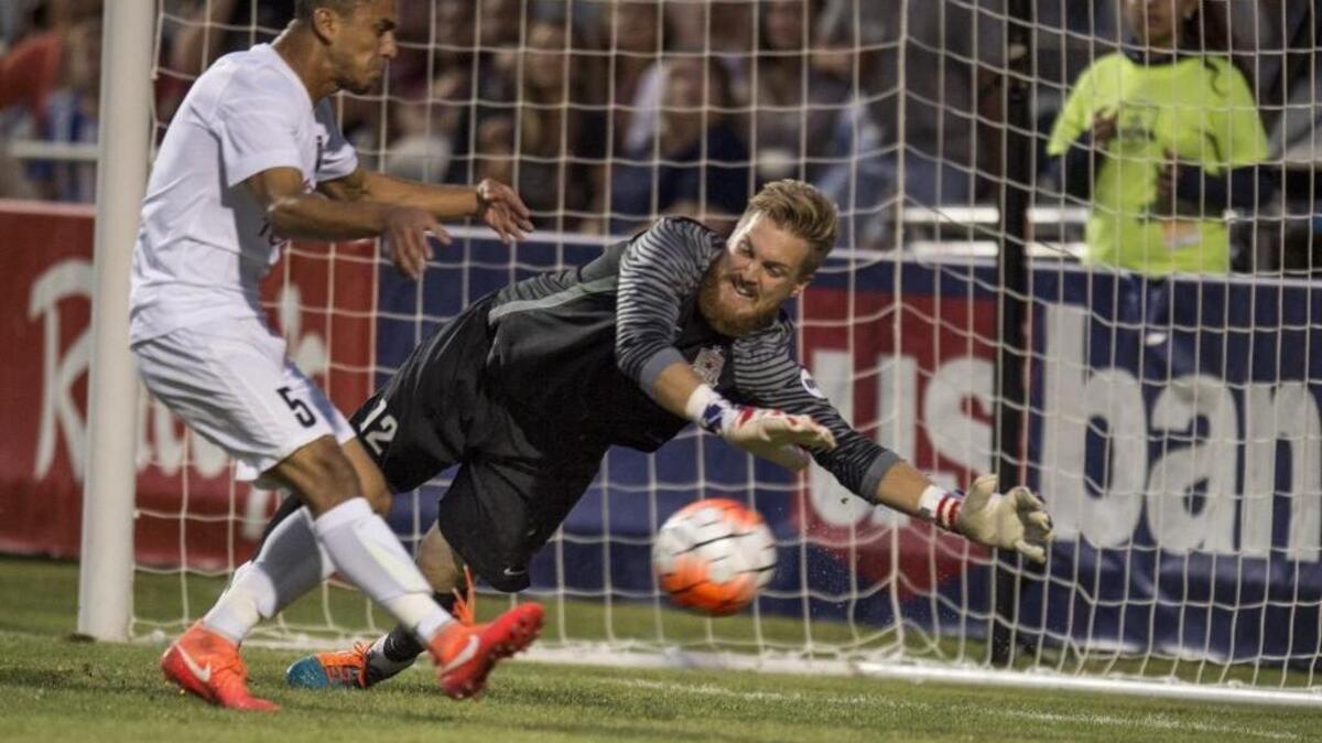 Ex-Republic FC goalkeeper Even Newton (12) tries to block a shot by San Antonio FC forward Cesar Elizondo (5) during a 2016 match at Bonney Field in Sacramento.