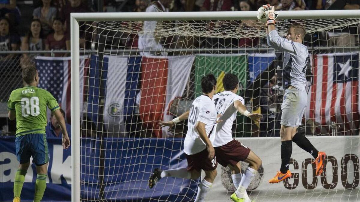 Republic FC goalkeeper Patrick McLain (24) stops a corner kick during the match between the Sacramento Republic FC and the Seattle Sounders FC II at Bonney Field in Sacramento on Saturday, August 1, 2015.