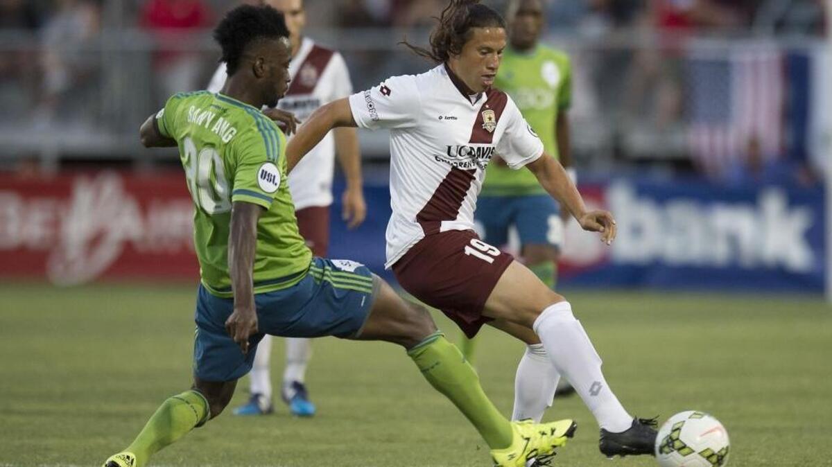 Sounders FC 2 midfielder Amadou Sanyang, left, defends against Republic FC midfielder Octavio Guzman Sanchez (19) during the USL soccer match Saturday, Aug. 1, 2015 at Bonney Field in Sacramento. Republic FC will open its 2016 USL season on the road against Seattle on March 25.
