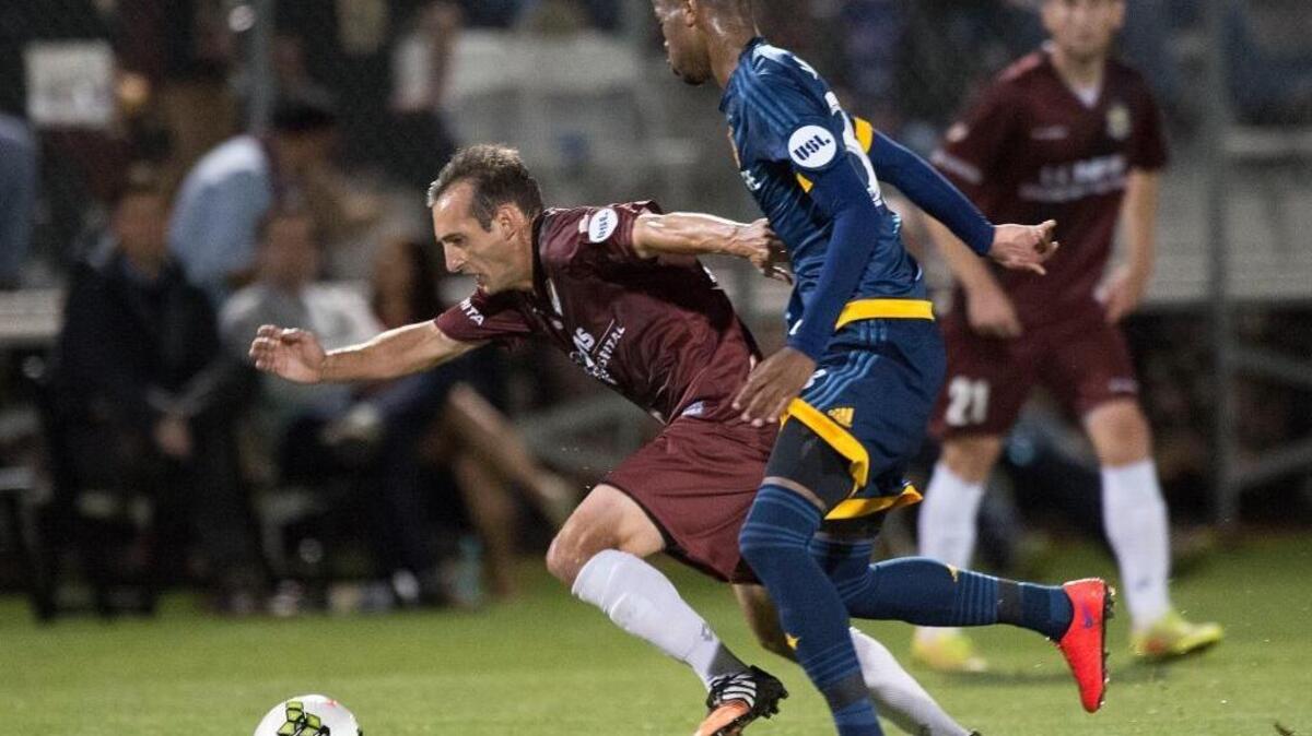 Republic FC midfielder Ivan Mirkovic (18) advances the ball during against LA Galaxy II at Bonney Field in Sacramento on April 11, 2015.