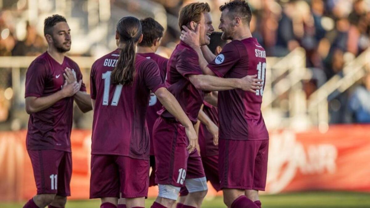 Sacramento Republic forward Mackenzie Pridham, center, celebrates with Republic forward Thomas Stewart, right, after scoring a goal in a friendly match against MLS side San Jose Earthquakes on Saturday, Feb. 20, 2016, at Bonney Field in Sacramento, Calif.