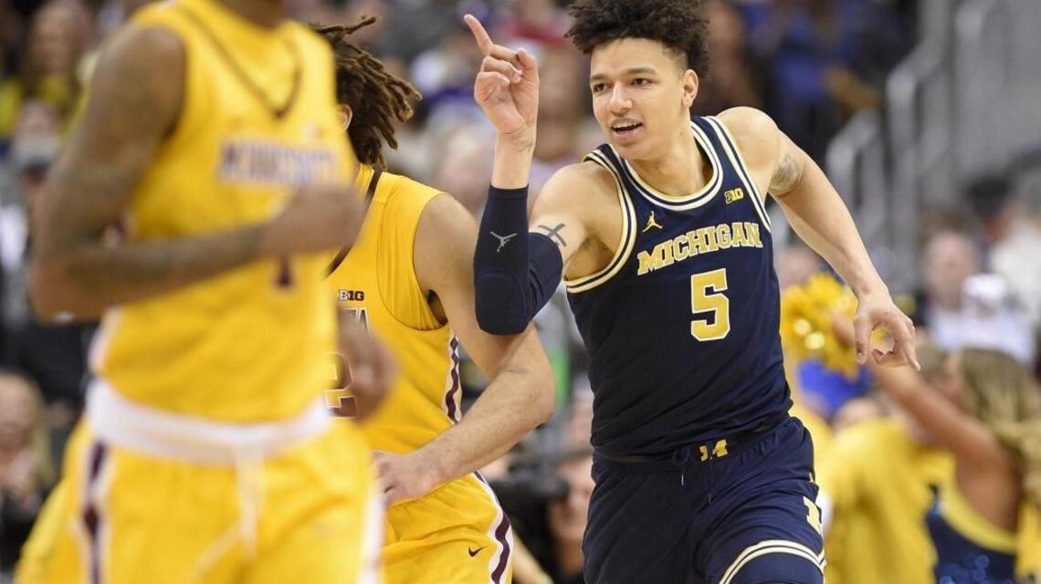 Michigan’s DJ Wilson to decide if NBA draft pool is warm enough to dive in