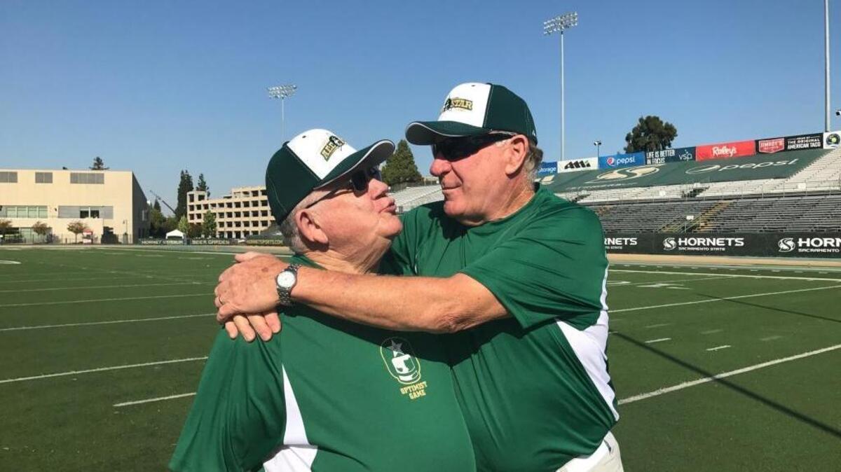 Max Miller, left, of the South team and John Volek of the North, coaches for the 61st Optimist All-Star Football Classic on Saturday, Jan. 19, at Sacramento State, are old pals who have brought glory back to the annual game for area seniors.