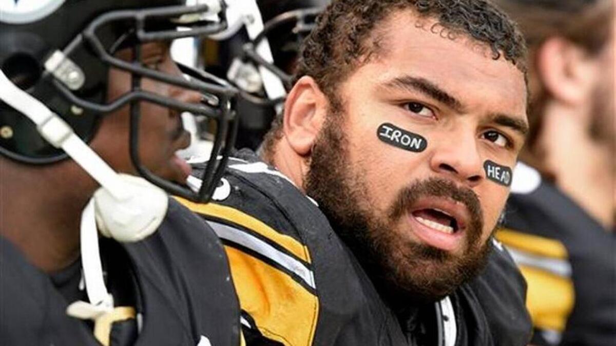 
Steelers defensive end Cam Heyward has his father’s nickname on his eyeblack during Pittsburgh’s NFL game against the Arizona Cardinals on Sunday, Oct. 18, 2015. Hayward was fined again by the league for what it terms a uniform violation.
